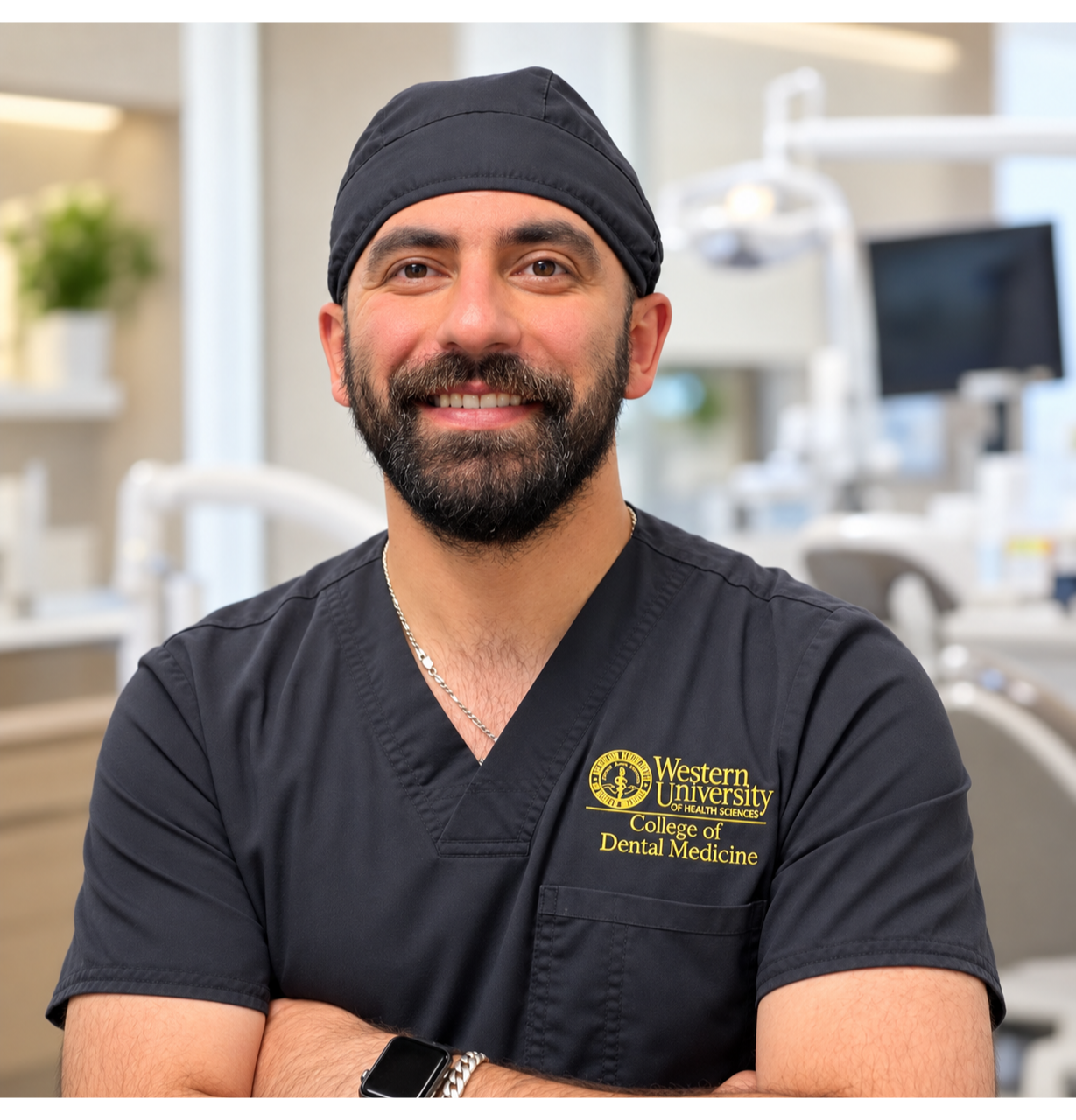 A dentist wearing scrubs and a surgical cap smiles in a modern dental clinic with treatment chairs in the background.